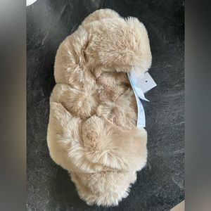 Never worn, soft too, hard bottom slippers.